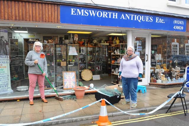 Emsworth Antiques Etc, in West Street, Emsworth, had a car reverse into their shop window on Monday, November 4.
Pictured is: (l-r) Lisa Marie Wood, shopkeeper and Hilary Bolt, owner.
Picture: Sarah Standing (041119-1072)