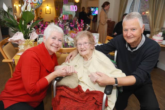 Doris Huzinga with Laraine and Pete Rodd who were Doris's neighbours when she lived in White Hart Lane, Portchester, 50 years ago. Picture: Sarah Standing (311019-781)
