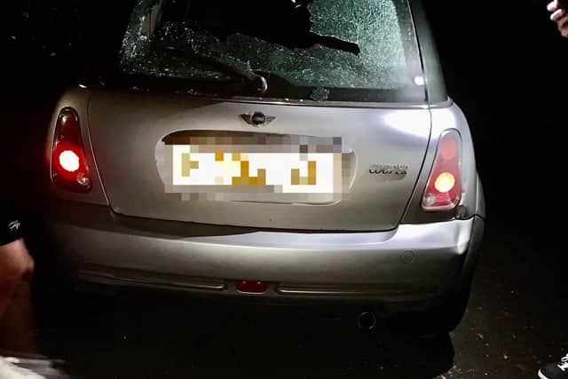 The smashed Mini Cooper, parked in Weyhill Close.