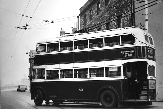 Reversing into East Street from Broad Street, Old Portsmouth, in 1937/38 is a trolleybus on route 15/16 to and from Copnor Bridge. Picture: Barry Cox collection.