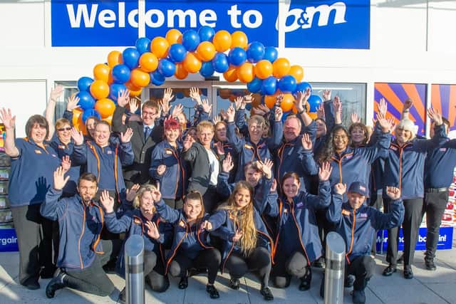 7/11/19The new B&M store in Ocean Retail Park, Portsmouth has opened. Pictured:  Staff of B&M ready to welcome their first customers.Picture: Habibur Rahman