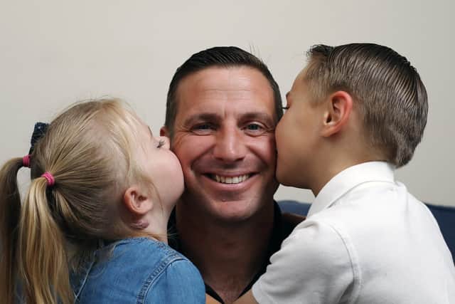 Major Andy Wilson with his children, Aaron, seven, and Ruby, three, at home in Stubbington. Picture: Chris Moorhouse (070619-21)