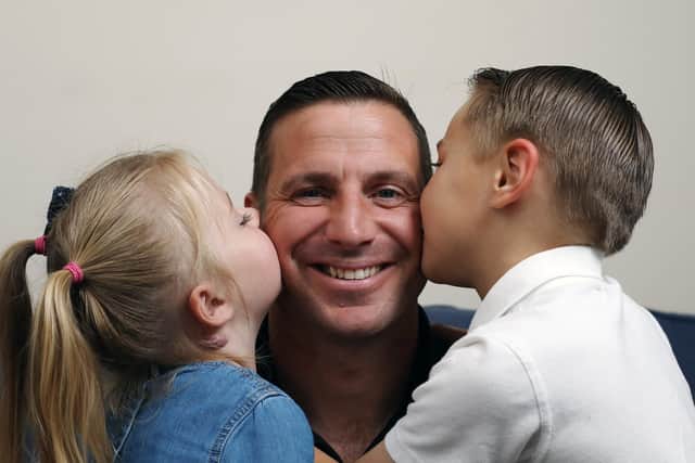 Major Andy Wilson with his children, Aaron, seven, and Ruby, three, at home in Stubbington.              Picture: Chris Moorhouse           (070619-21)