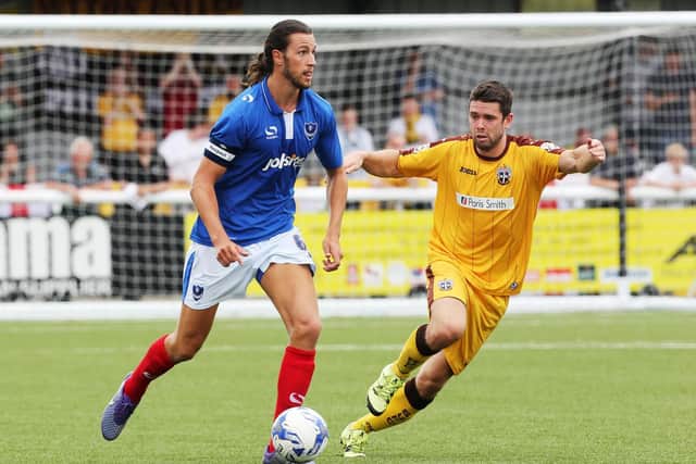 Christian Burgess was Pompey skipper the last time they played on an artificial pitch - in a July 2016 defeat at Sutton United. Picture: Joe Pepler