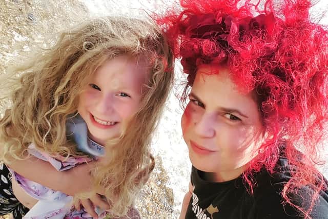 Candy Medusa, right, with her daughter Bluebell