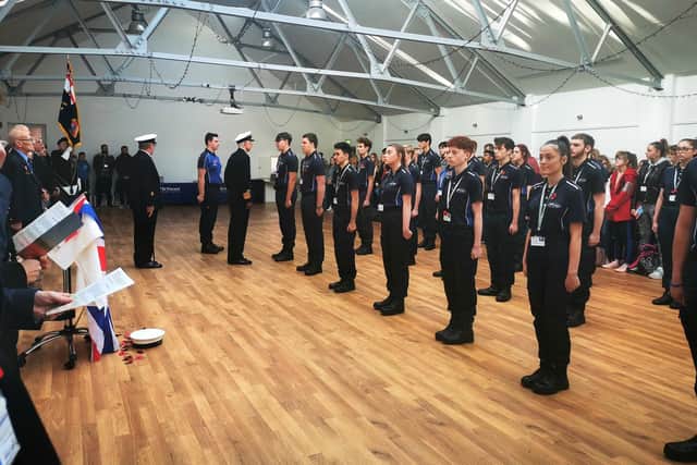 Remembrance at St Vincent College Gosport. Pictured: Admiral Sir Alan Massey speaks with students on the uniformed public services course