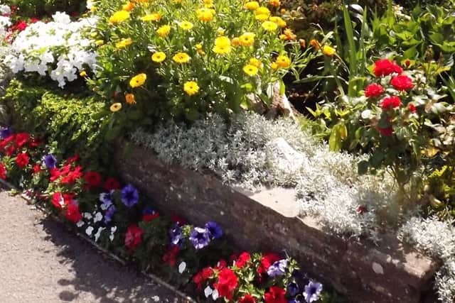 Bob Hind's garden wall, which is made up of parts of the Berlin Wall.