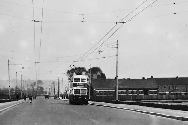 Heading south along Northern Parade, Hilsea, Portsmouth, in 1937 is a trolleybus on its way to South Parade Pier.