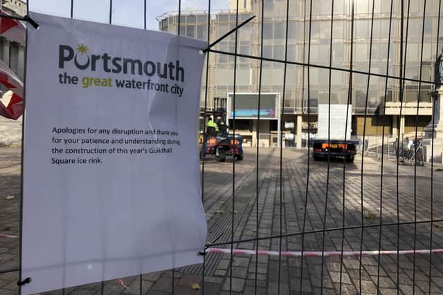 Much of Guildhall Square, Portsmouth, has been closed off today (Tuesday, November 12) as workers begin setting up the city's popular annual ice rink. Picture: Byron Melton