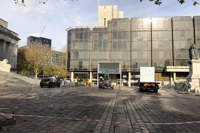 Much of Guildhall Square, Portsmouth, has been closed off today (Tuesday, November 12) as workers begin setting up the city's popular annual ice rink. Picture: Byron Melton