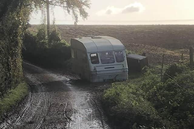 Photos show a caravan and bed dumped in Rushmere Lane between Denmead and Hambledon near the junction of Pit Hill Lane and Kidmore Lane. There was also a sofa, garden waste, household waste and a large picture of Liam Gallagher. Picture: Paul Heanes