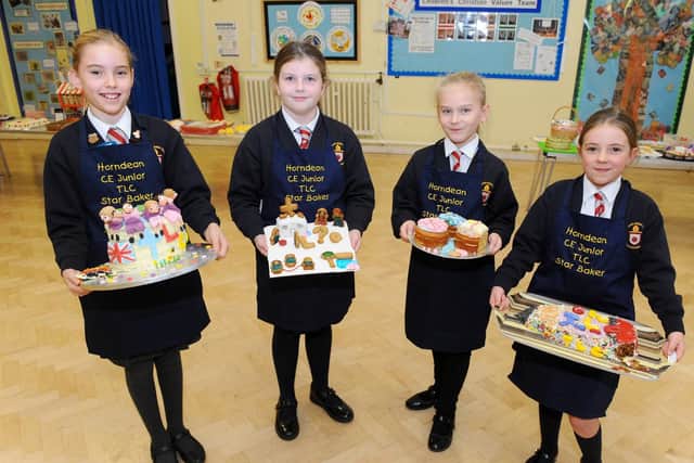 Horndean C of E Junior School in Five Heads Road, Hordean, held a Bake Off competition on Tuesday, November 12 at the school, raising money for Children in Need.

Pictured is: (l-r) Winners from each year group Tilly Shorten (11), Hayley Barton (9), Lottie Golding (8) and Izzy Leggatt (8).

Picture: Sarah Standing (121119-1859)
