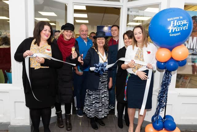 The mayor of Gosport, Cllr Kathleen Jones, cuts the ribbon to open the new store. Picture: Duncan Shepherd