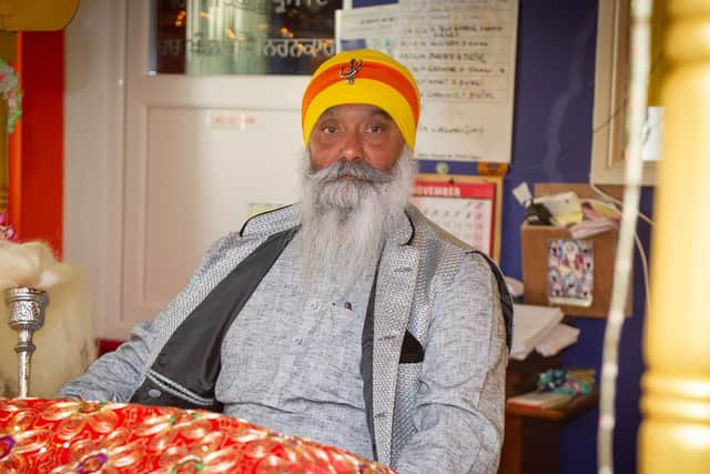 Granthi Ray Singh paying respects to Guru Nanak Dev Ji at the temple.

Picture: Habibur Rahman