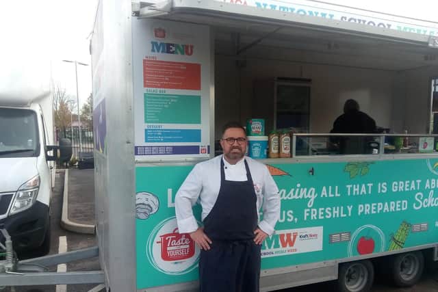 Britain's top school chef, Steve Cross, alongside the Taste for Yourself Tour trailer.