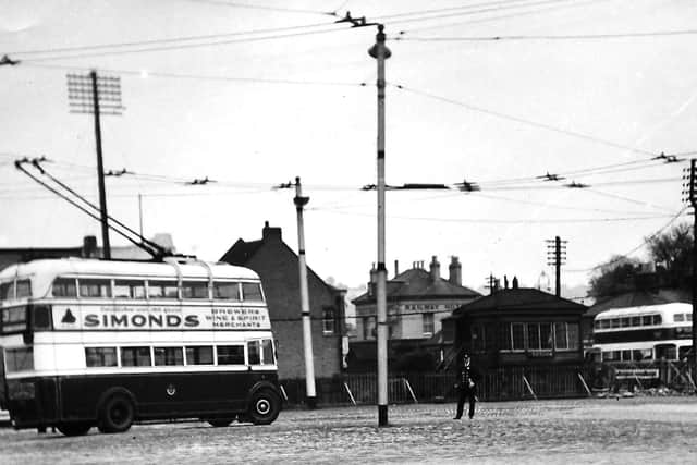 Cosham bus compound. Looking towards Cosham signal box with the Railway Hotel behind it. Picture: Barry Cox collection.