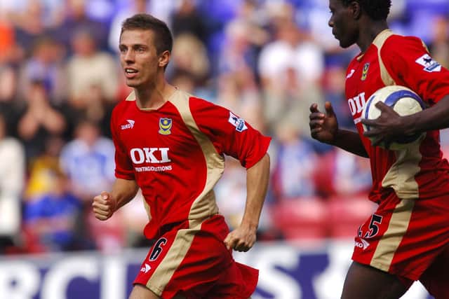 Gary O'Neil and goalscorer Benjani Mwaruwari in the memorable Great Escape match at Wigan in April 2006. Picture: Neal Simpson