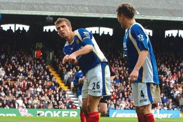 Gary O'Neil uses a golf club celebration to mark the first of his two goals in the 3-1 win at Fulham in April 2006