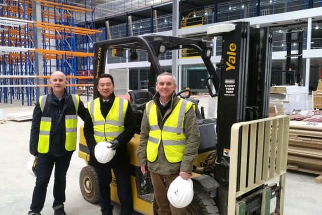 Havant MP Alan Mak with FatFace chief executive Anthony Thompson and infrastructure director Simon Ratcliffe