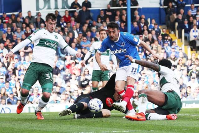 Gary Roberts scores against Plymouth at Fratton Park back in April Picture: Joe Pepler