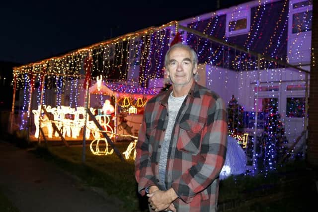 Dave Watson pictured outside his lit up home.
Picture: Habibur Rahman