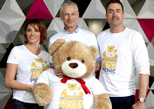 Sarah Parish, Trethowans managing partner Chris Whiteley and Jim Murray launch the second year of Teddy Bears Picnics across the south