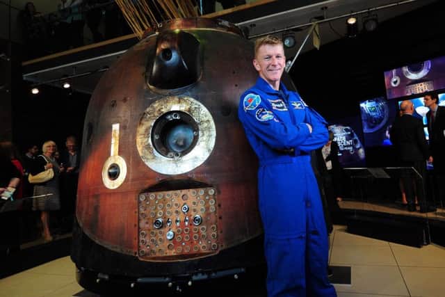 Tim Peake with the Soyuz spacecraft at the National Science and Media Museum in Bradford