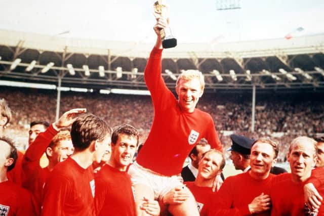 Bobby Moore holds aloft the Jules Rimet World Cup trophy in 1966 Picture: Popperfoto/Getty Images)