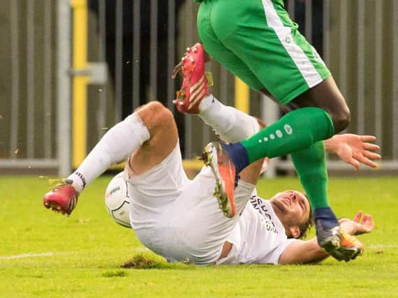 Matt Tubbs took a tumble to earn the Hawks a penalty in their FA Trophy win over Dorking