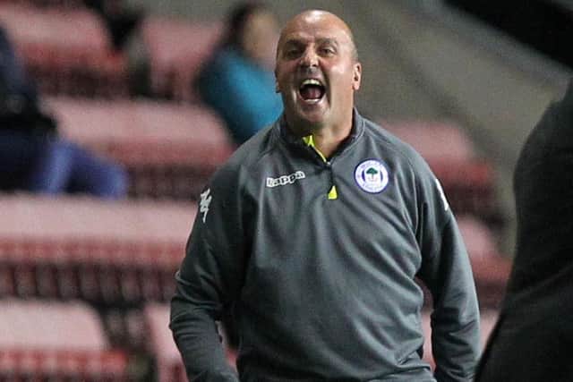 Former Pompey boss Paul Cook guided Wigan Athletic back to the top of League One