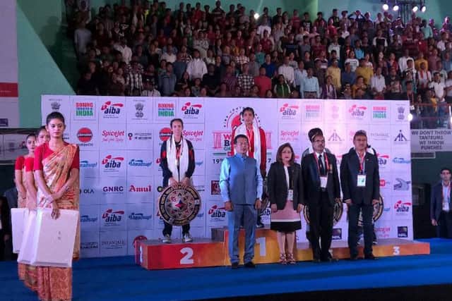 Heart of Portsmouth's Ivy-Jane Smith collects her silver medal at the AIBA World Youth Championships in India. Picture: England Boxing