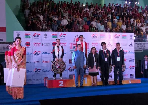 Heart of Portsmouth's Ivy-Jane Smith collects her silver medal at the AIBA World Youth Championships in India. Picture: England Boxing