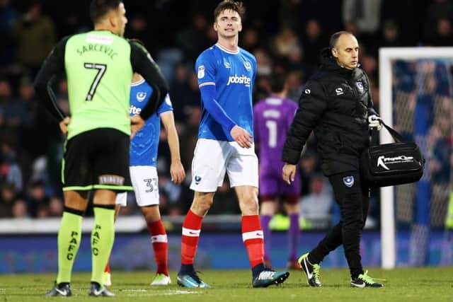Oli Hawkins limps off. Picture: Joe Pepler