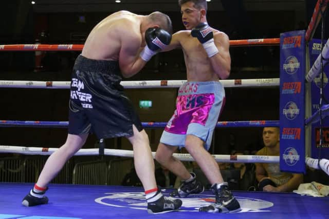 Lucas Ballingall in action against Michael Dehamnia. Picture: Neil Marshall (1713340-659)