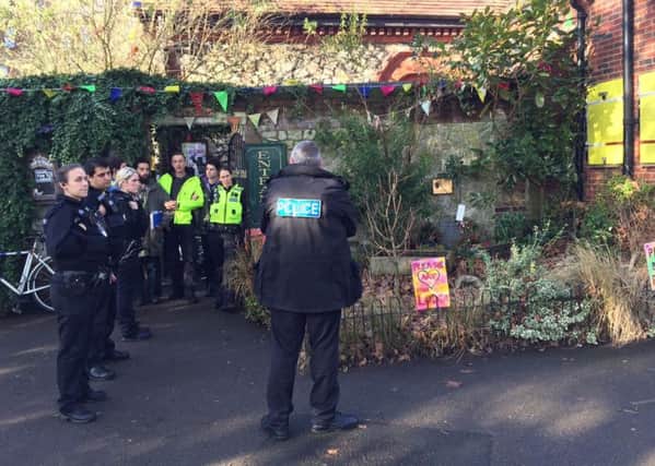 Police at the Arts Lodge in Victoria Park during the eviction of Mark Lewis