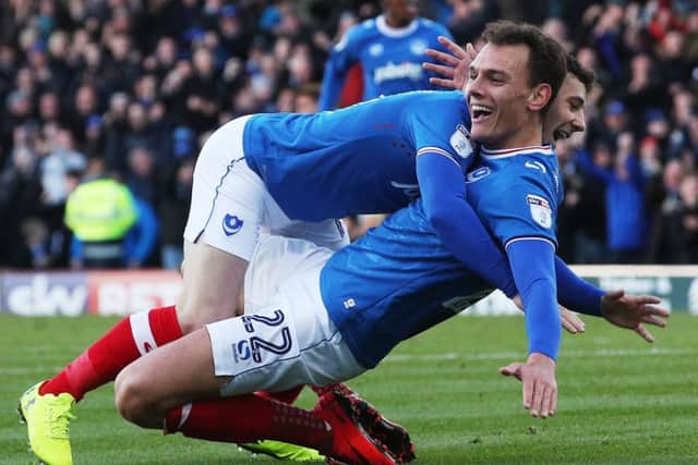 Pompey forward Kal Naismith celebrates his goal against Plymouth with Conor Chaplin Picture: Joe Pepler