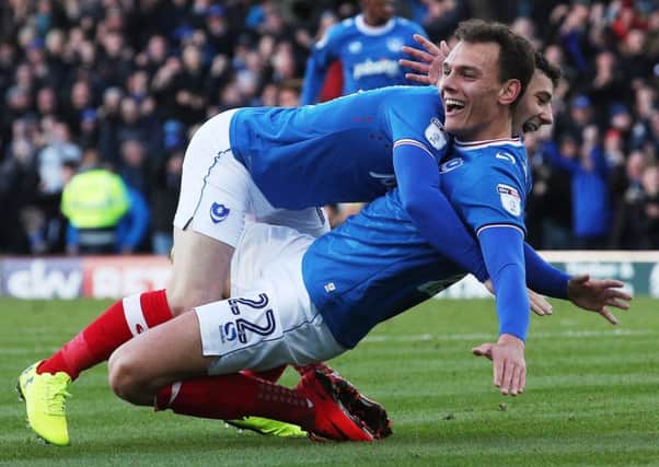 Pompey forward Kal Naismith celebrates his goal against Plymouth with Conor Chaplin Picture: Joe Pepler