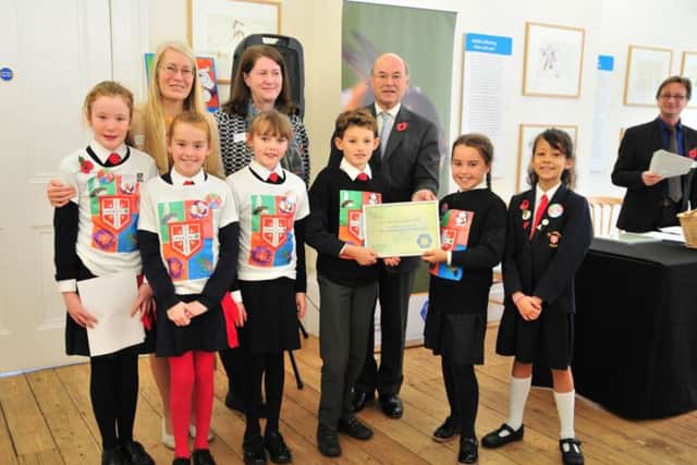 St Alban's Primary with their bee awards from Defra