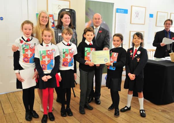 St Alban's Primary with their bee awards from Defra