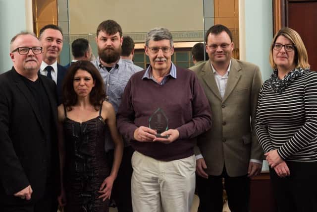 Brendan Charles, left, and colleagues receive the Best Garden Award on behalf of Horndean Community Association from Linzi Stean, right, from sponsor Colas