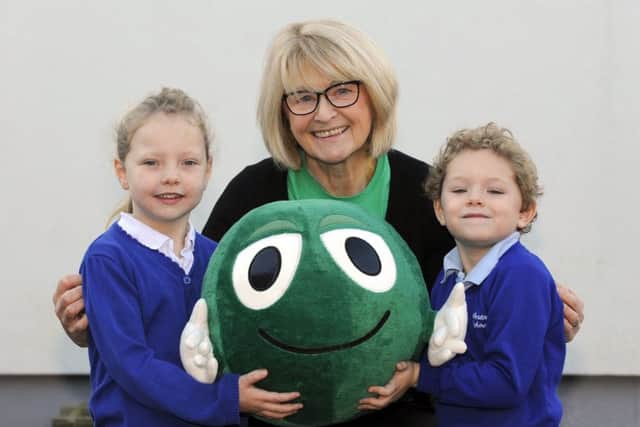Six-year-olds Poppy Bamborough and Luka Drain with NSPCC Volunteer Sallye Corbett     Picture: Malcolm Wells (171130-3797)