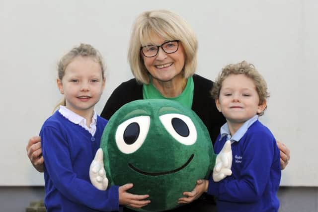 Six-year-olds Poppy Bamborough and Luka Drain with NSPCC Volunteer Sallye Corbett     

Picture: Malcolm Wells (171130-3797)