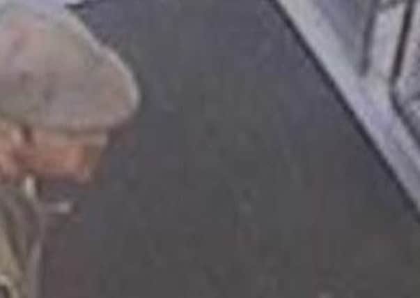 CCTV released after a distraction burglary in Hambrook Road, Gosport. The image shows two men wearing hats and was recorded on November 8.