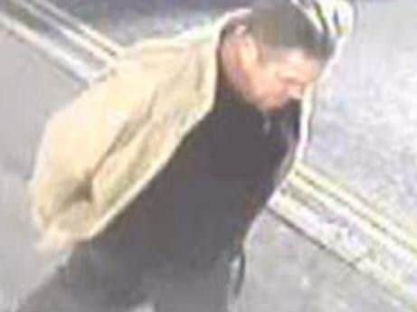 CCTV released after a distraction burglary in Hambrook Road, Gosport. The image shows a man wearing a light coloured jacket on San Diego Road on November 8.