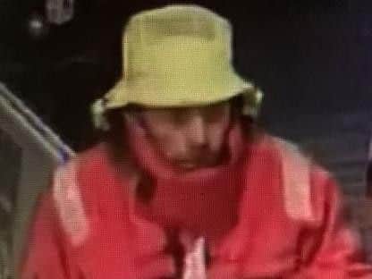CCTV released after a distraction burglary in Reed Road, Gosport. It shows an image of a man wearing a hat and a red coat at Morrisons, in Gosport, found as part of police enquiries into the burglary at Reed Road on Wednesday November 29.