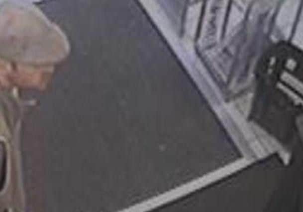 CCTV released after a distraction burglary in Hambrook Road, Gosport. The image shows two men wearing hats and was recorded on November 8.