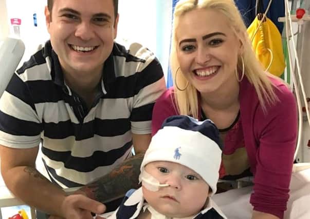Max Olivares is celebrating his first birthday after being born at 27 weeks. He has pulmonary vein stenosis and has never left hospital. He's pictured with parents Hannah Bloomfield and Wayne Olivares, from North End