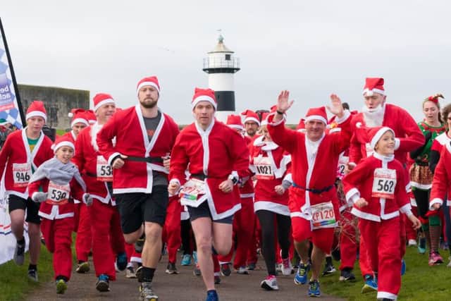 They're off! The start of the Santa Fun Run in Southsea    Picture: Duncan Shepherd