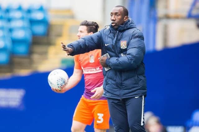 Jimmy Floyd Hasselbaink issues instructions to his team at Pompey.