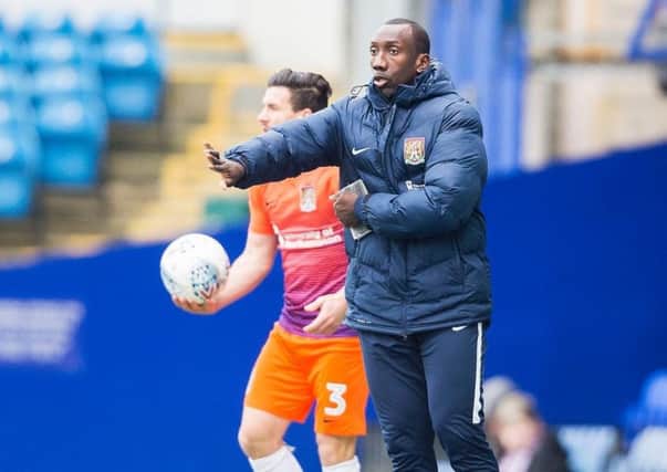 Jimmy Floyd Hasselbaink issues instructions to his team at Pompey.